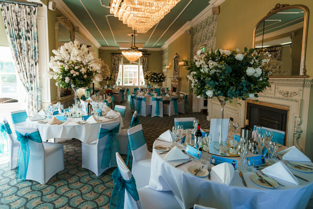 Turquoise table and chair decor for a wedding breakfast at The Bedford Swan Hotel